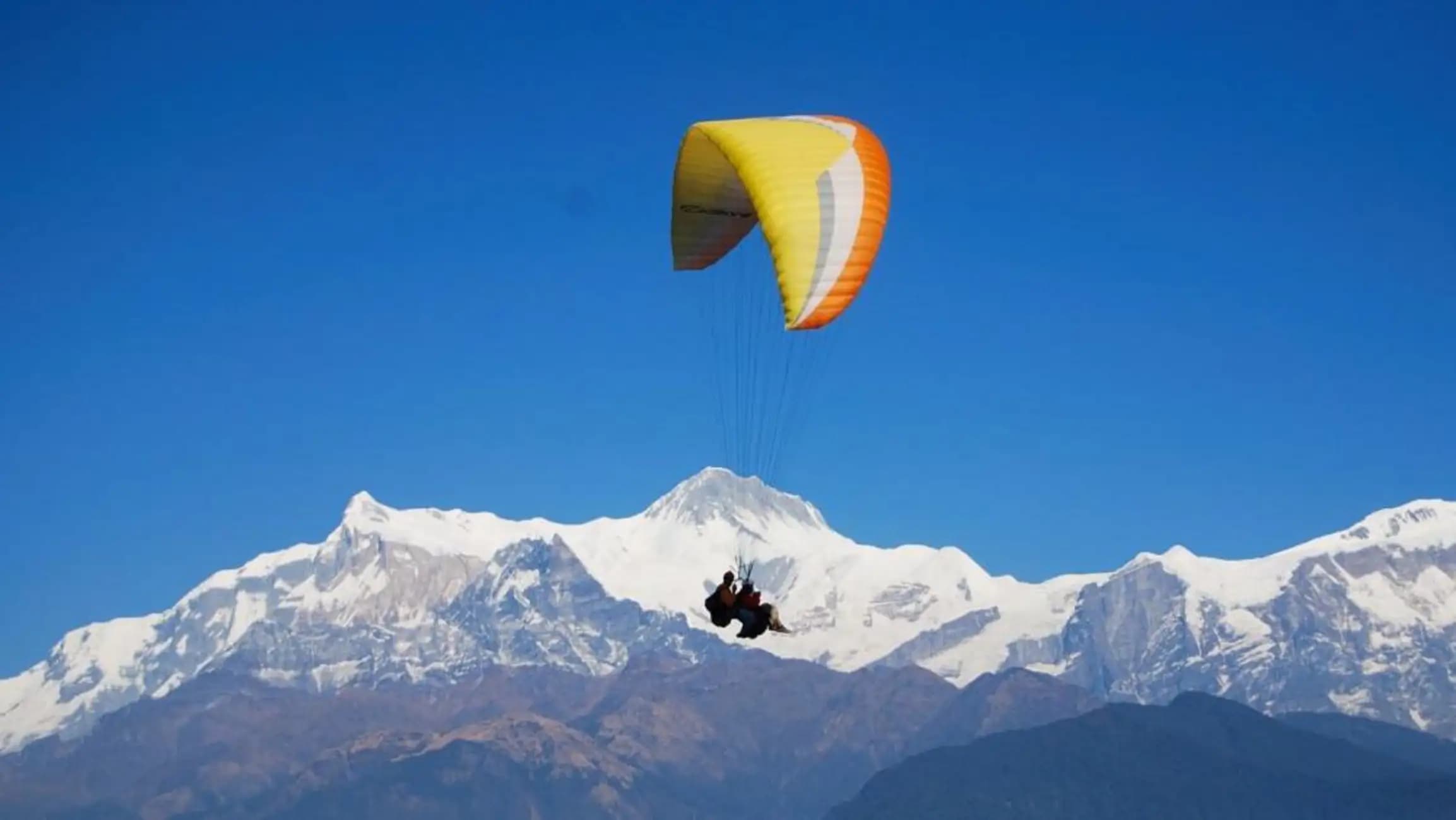 Image of Pokhara: Paragliding Adventure with Photos and Video tour package, BookMe Tour Package, Travel with BookMe, Exciting Tour Packages Available, Affordable Prices.
